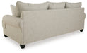 Ashley Furniture Asanti Sofa with plush cushions and stylish design, shown from the back view in a modern living room setting.