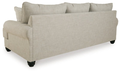 Ashley Furniture Asanti Sofa with plush cushions and stylish design, shown from the back view in a modern living room setting.
