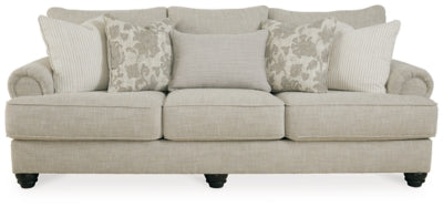 Ashley Furniture Asanti Sofa with plush cushions and elegant design, shown in a head-on view highlighting the fabric and structure.