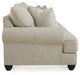 Ashley Furniture Asanti sofa with plush fabric and stylish design, shown in a side view highlighting its elegant cushions.