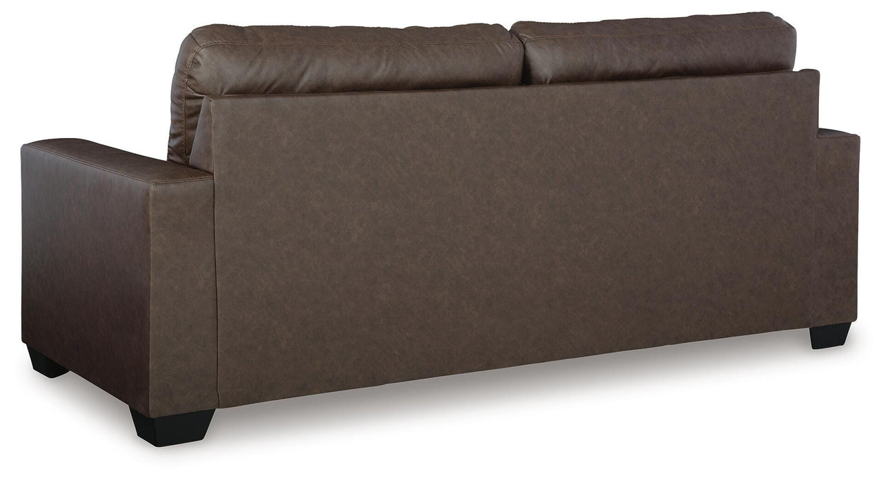 Ashley Furniture Barlin Mills sofa with plush cushions and wooden legs, shown from the back in a modern living room setting.