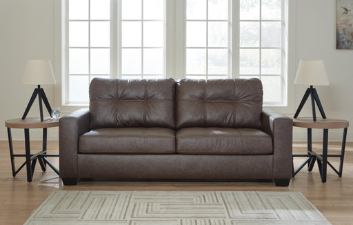 Ashley Furniture Barlin Mills Sofa with plush beige upholstery and rolled armrests, shown from the front.