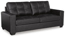 Ashley Furniture Barlin Mills sofa shown in an angled view, featuring plush upholstery and modern design for living room comfort.