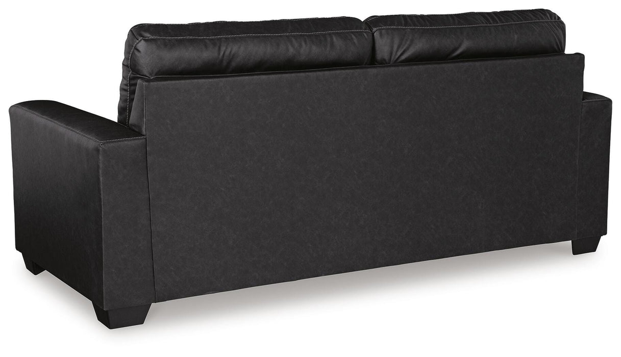 Ashley Furniture Barlin Mills sofa with plush back cushions and stylish upholstery, shown from the back in a cozy living room setting.