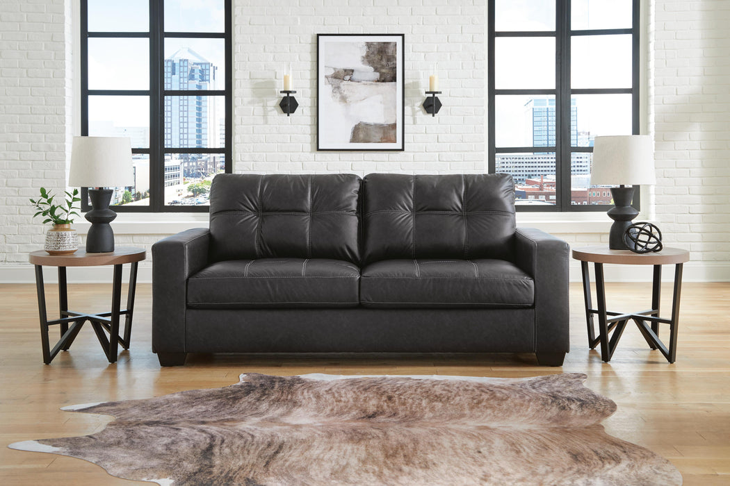 Ashley Furniture Barlin Mills sofa with plush cushions and wooden legs, shown in a modern living room setting.