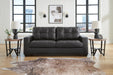 Ashley Furniture Barlin Mills sofa with plush cushions and wooden legs, shown in a modern living room setting.