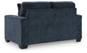 Ashley Furniture Aviemore loveseat with plush fabric, featuring a cozy backrest and comfortable seating for living room decor.