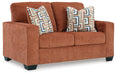 Ashley Furniture Aviemore loveseat with plush fabric, angled view showcasing comfortable seating and stylish design.