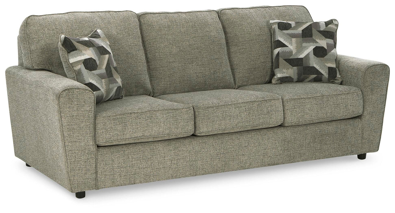 Ashley Furniture Cascilla sofa shown from an angled view, featuring plush cushions and modern design in a stylish living room setting.