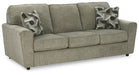 Ashley Furniture Cascilla sofa shown from an angled view, featuring plush cushions and modern design in a stylish living room setting.
