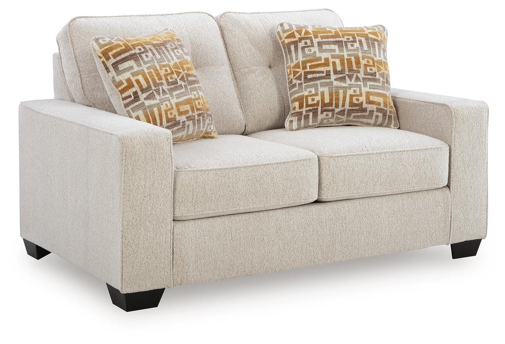Ashley Furniture Larimer living room set with sofa and armchair, showcasing neutral fabric upholstery and wooden legs.