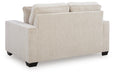 Ashley Furniture Larimer living room set with plush sofas and coordinating chairs, shown in a cozy, modern living space.