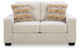 Ashley Furniture Larimer living room set with a plush sofa and matching armchair in a contemporary design.