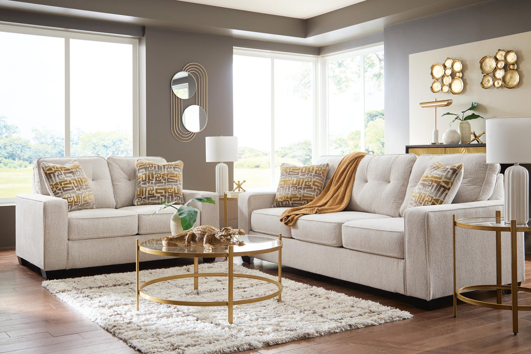 Ashley Furniture Larimer living room set with plush sofa and matching chairs shown in a cozy, modern living space.