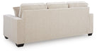 Ashley Furniture Larimer living room set showing a sofa with plush cushions and matching armchair in a modern design.