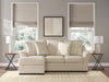Ashley Furniture Lango Sofa Chaise Sleeper with plush upholstery and modern design, featuring a convertible sleeper and chaise lounge.