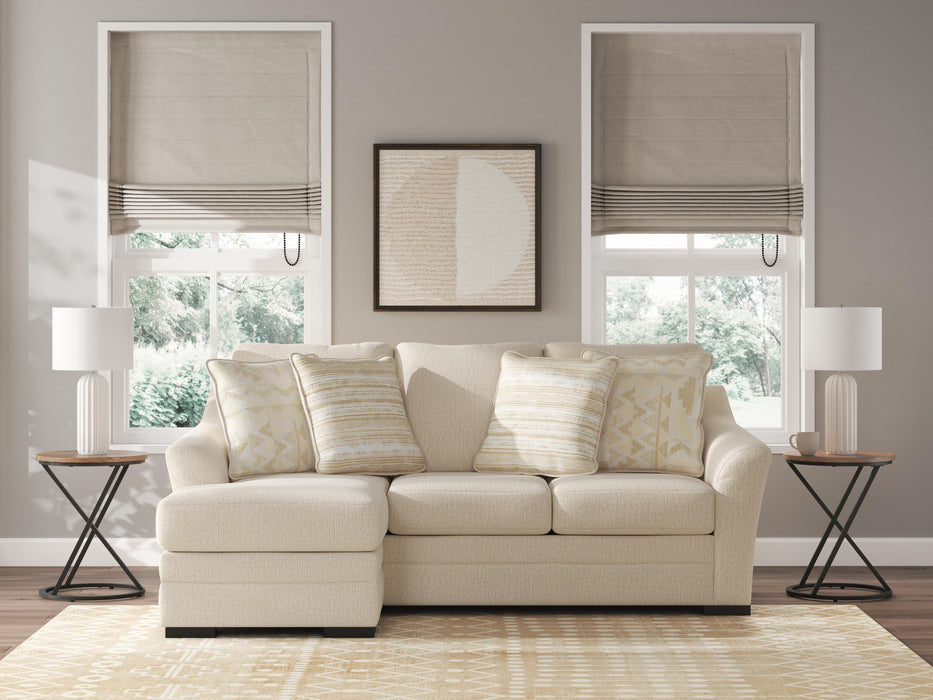 Ashley Furniture Lango Sofa Chaise Sleeper with plush upholstery and modern design, featuring a convertible sleeper and chaise lounge.