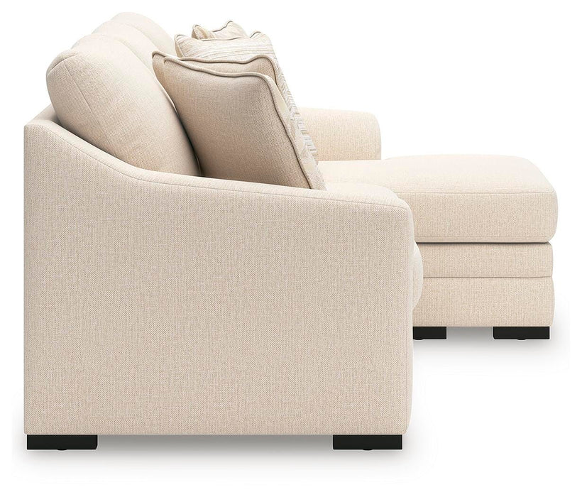 Ashley Furniture Lango Sofa Chaise Sleeper with plush fabric, side view showing chaise and convertible sleeper feature.