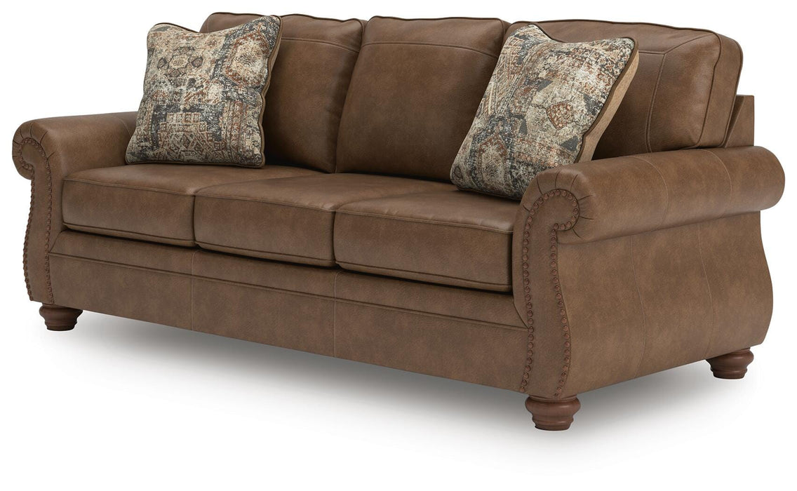 Ashley Furniture Chasemore sofa shown from an angled view, featuring plush cushions and stylish upholstery.