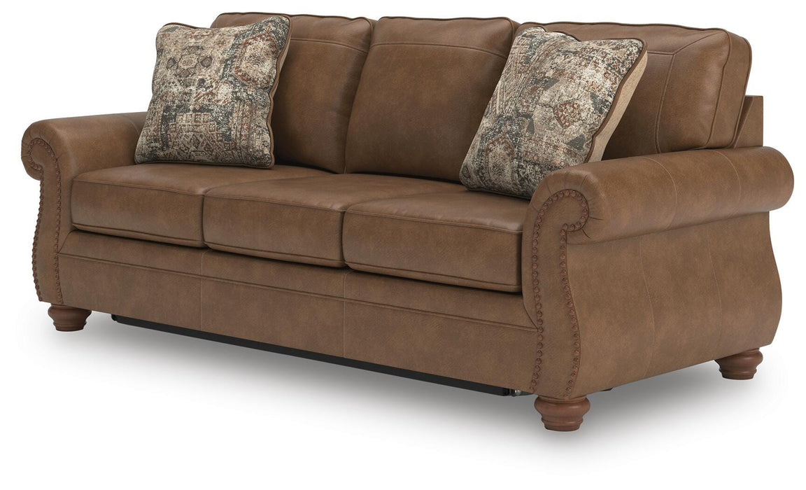 Ashley Furniture Chasemore Sleeper Sofa showcasing a comfortable fabric sofa with a fold-out bed in a modern living room setting.