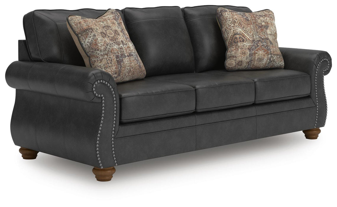 Ashley Furniture Chasemore sofa shown from an angled view, featuring plush cushions and a stylish contemporary design.