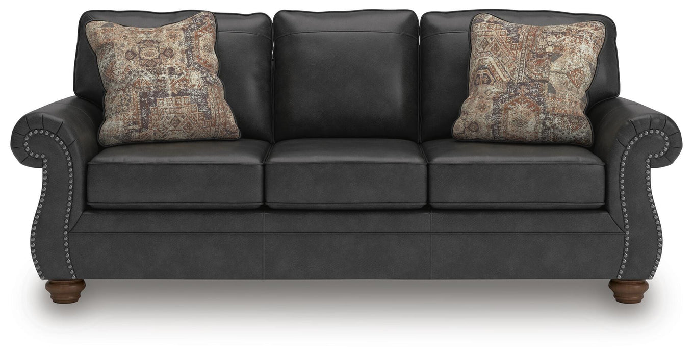 Ashley Furniture Chasemore sofa with plush cushions and neutral fabric, shown from a front head-on view.