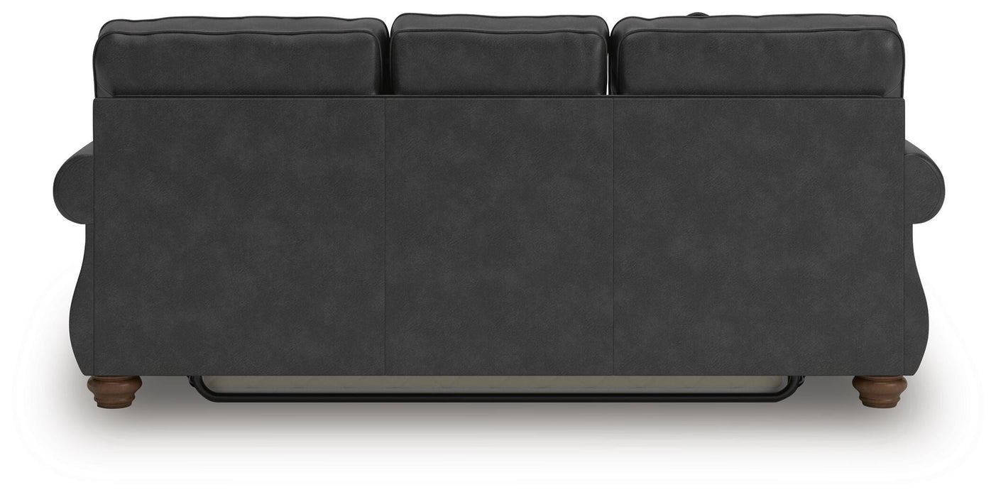 Ashley Furniture Chasemore Sofa Sleeper with plush upholstery and back cushions, designed for versatile comfort and sleeping functionality.