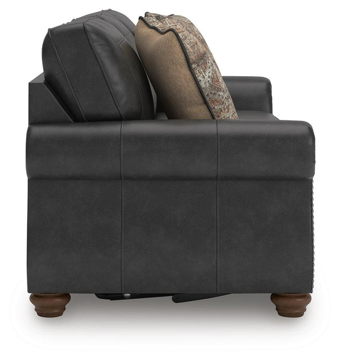 Ashley Furniture Chasemore Sleeper Sofa with side view, featuring plush upholstery and convertible sleeping surface.