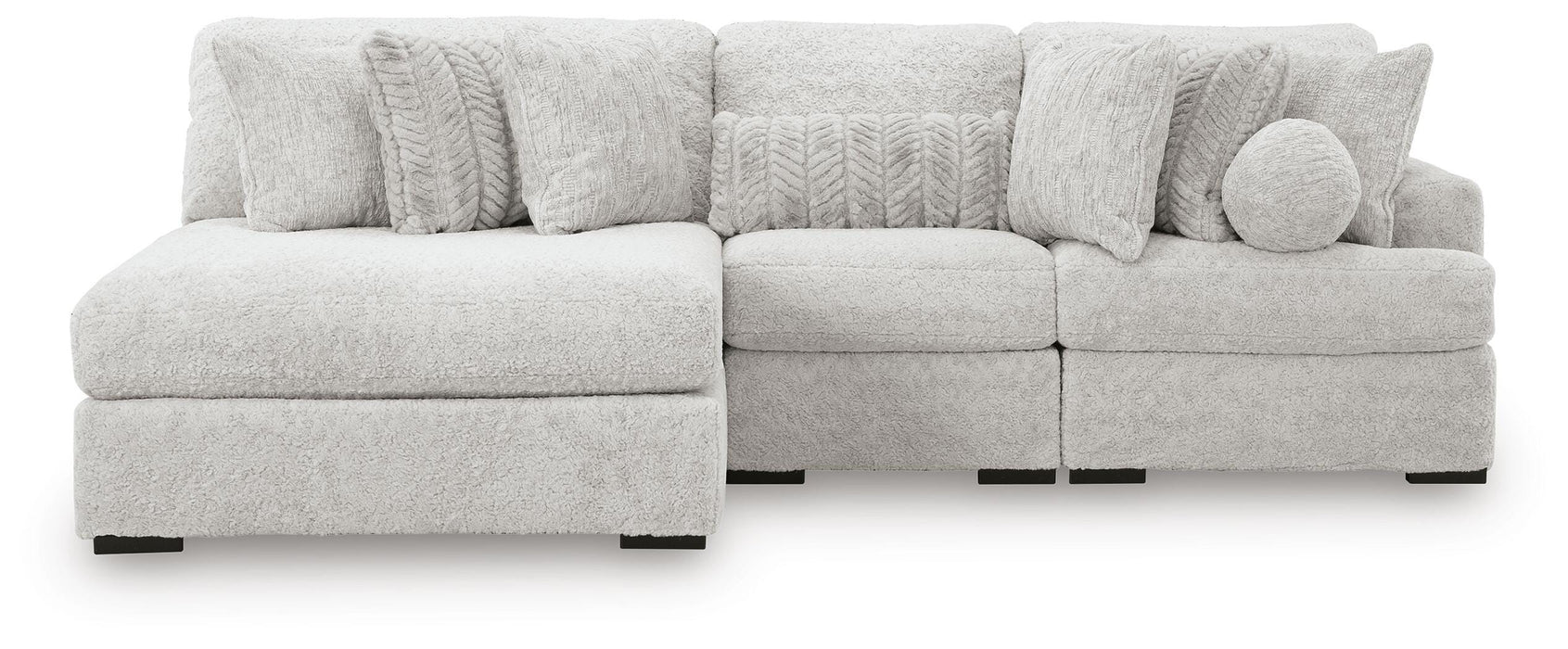 Ashley Furniture Cuddle Plush sectional with chaise showcasing soft fabric upholstery and modern design in a cozy living room setting.