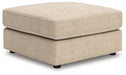 Ashley Furniture Seyler oversized accent ottoman with plush fabric and stylish design, shown from an angled perspective.