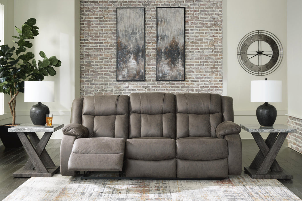 Open view of Ashley Furniture First Base Reclining Sofa showcasing plush cushions and reclining features in a modern living room setting.