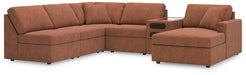 Ashley Furniture Modmax sectional with chaise, featuring modern design and plush cushions in a stylish living room setting.