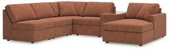 Ashley Furniture Modmax sectional with chaise, featuring a modern fabric design and plush cushions in a stylish living room setting.