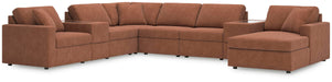 Ashley Furniture Modmax sectional with chaise, featuring plush cushions and modern design, shown in a cozy living room setting