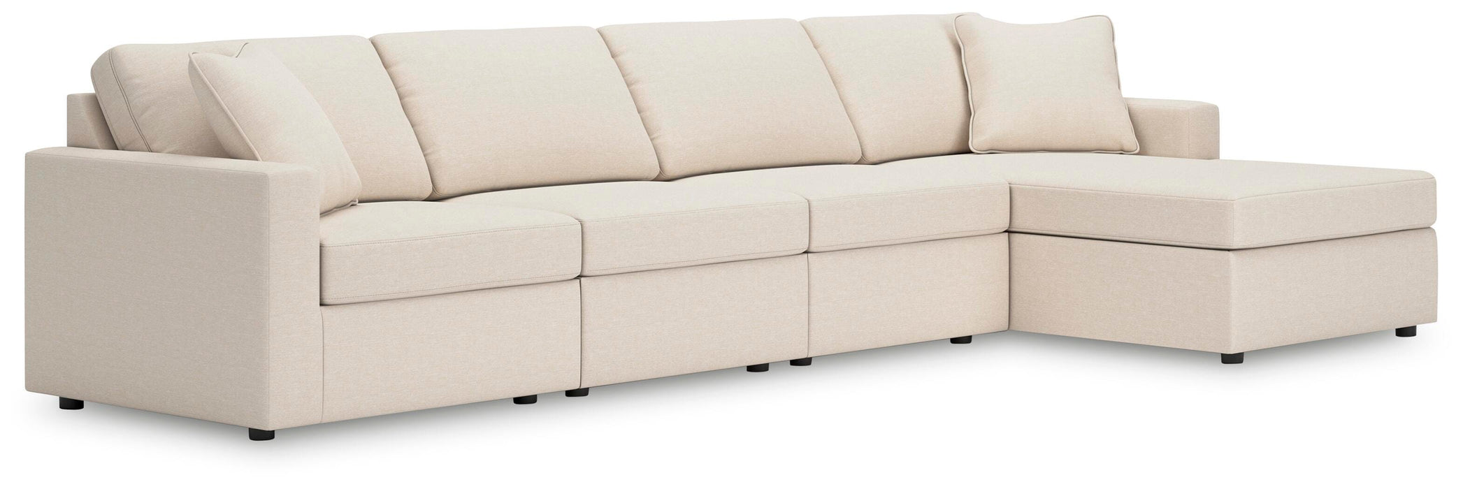 Ashley Furniture Modmax sectional with chaise, showing modern fabric upholstery and plush seating in a stylish living room setting.