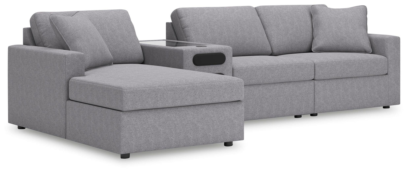 Ashley Furniture Modmax sectional with chaise, featuring modern design and plush upholstery in a spacious living room setting.