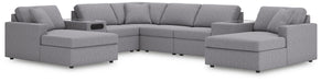 Ashley Furniture Modmax sectional with chaise, showing a modern fabric sofa with a spacious seating area and chaise lounge.