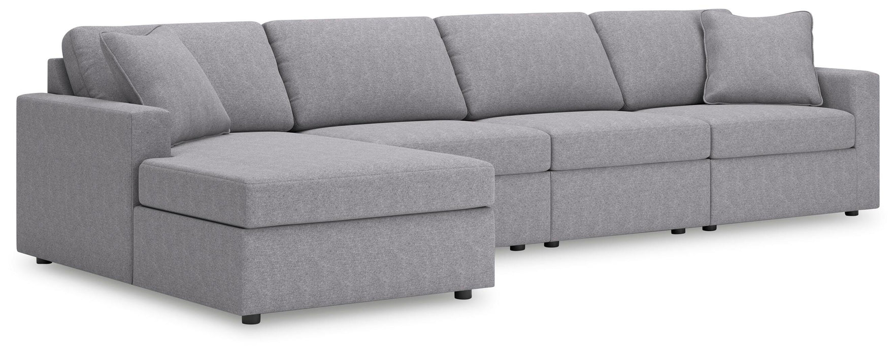 Ashley Furniture Modmax sectional with chaise, showing a modern fabric sofa with a spacious chaise lounge and angled view.