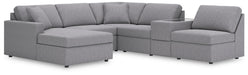 Ashley Furniture Modmax sectional with chaise showing plush fabric, modern design, and comfortable seating arrangement.
