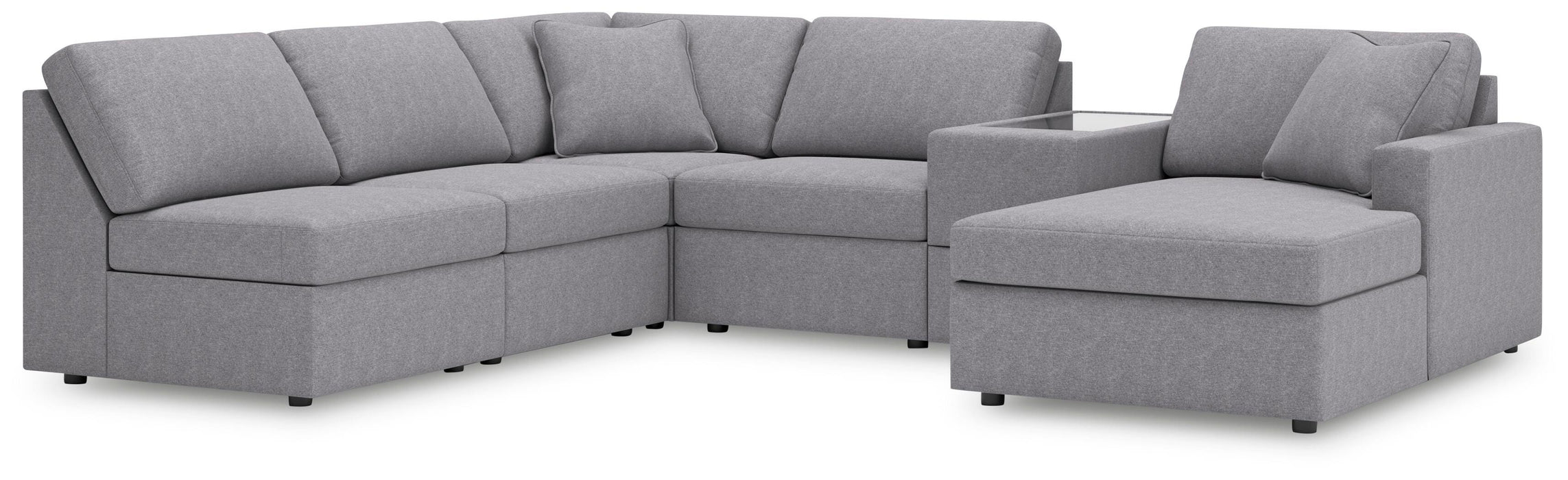 Ashley Furniture Modmax sectional with chaise, featuring plush cushions and modern design in a cozy living room setting.