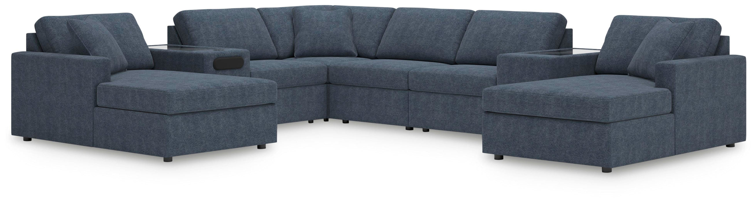 Ashley Furniture Modmax sectional with chaise, featuring modern design and plush cushions in a stylish living room setting.
