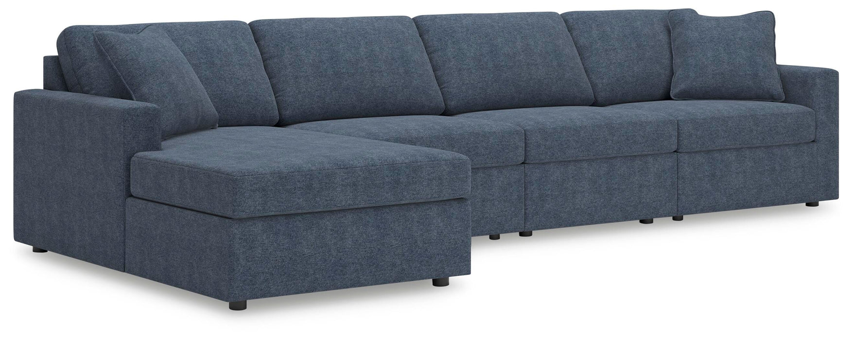 Ashley Furniture Modmax sectional with chaise featuring plush cushions and modern design in a neutral fabric.