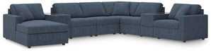 Ashley Furniture Modmax sectional with chaise, featuring sleek upholstery and modern design, shown in a stylish living room setting.