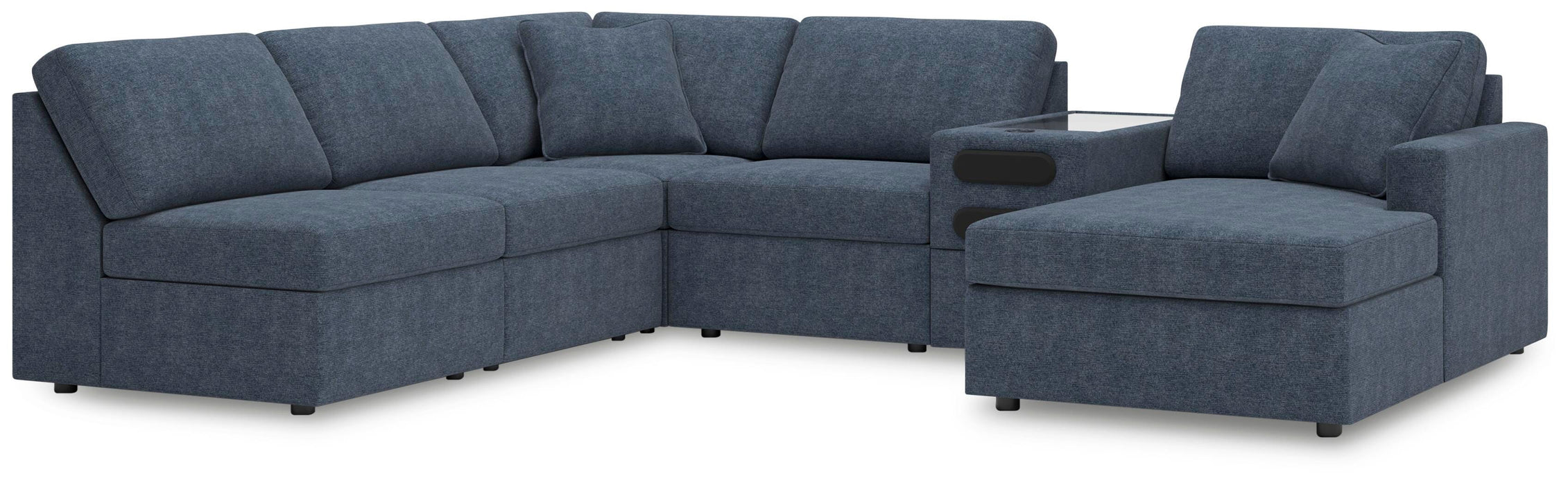 Ashley Furniture Modmax sectional with chaise, featuring plush fabric and modern design, shown in a living room setting.