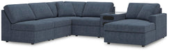 Ashley Furniture Modmax sectional with chaise, featuring plush fabric and modern design, shown in a living room setting.