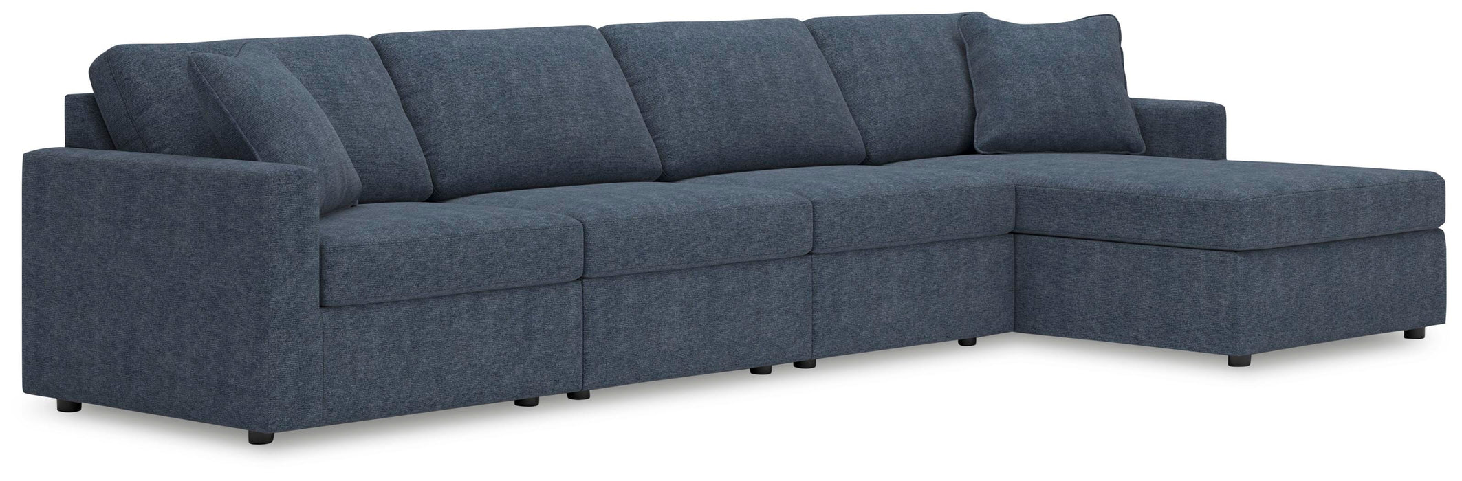 Ashley Furniture Modmax sectional with chaise, featuring plush upholstery and modern design, shown in a stylish living room setting.