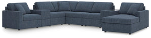 Ashley Furniture Modmax sectional with chaise, showing modern fabric upholstery and spacious seating arrangement.