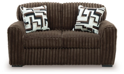 Ashley Furniture Midnight-Madness Loveseat with plush dark upholstery and cozy seating, shown from a front head-on view.