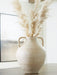 Ashley Furniture Justy Vase, decorative ceramic vase with a sleek design, shown in a close-up image.