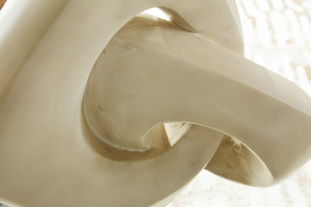 Detailed image of the Feebs Sculpture by Ashley Furniture, showcasing its artistic design and intricate craftsmanship.